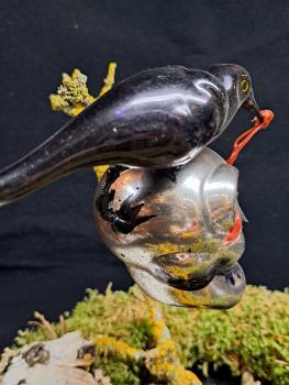Totenkopf mit Raabe