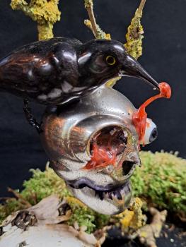 Totenkopf mit Raabe