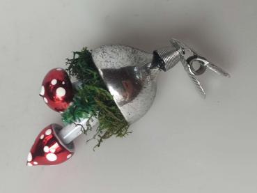 Brunnen mit Pilzen