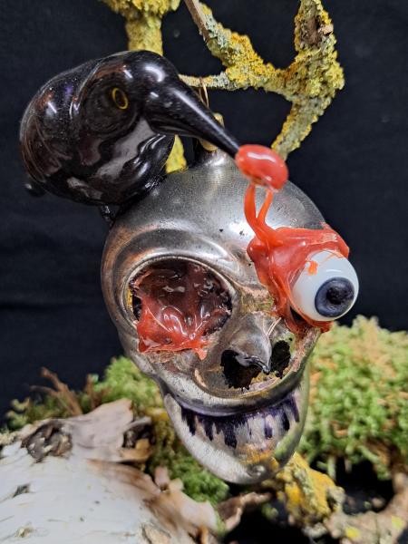 Totenkopf mit Raabe